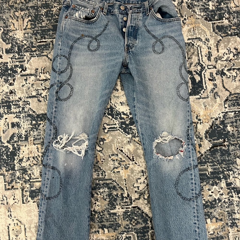 Levi's Light Blue Straight Leg Jeans with Swirl Stitching